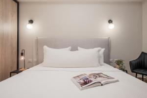 Ένα ή περισσότερα κρεβάτια σε δωμάτιο στο Baraca boutique