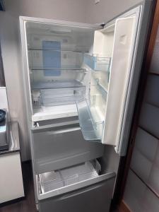 A kitchen or kitchenette at コリーヌ小山