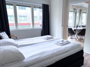 Postel nebo postele na pokoji v ubytování Stunning 2 BR Apartment In The City Centre