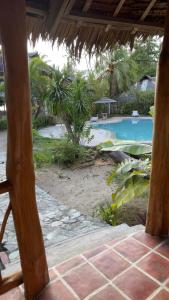 Bazén v ubytování Coral Cay Resort, Inc. nebo v jeho okolí