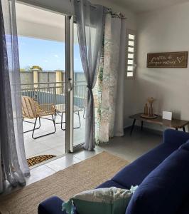 Posezení v ubytování Logement PALMIER