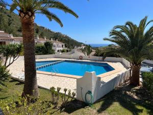 Swimmingpoolen hos eller tæt på Luces Del Mar Beautiful bungalow with seaview near to Moraira