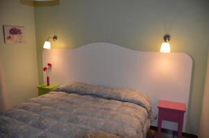 Postel nebo postele na pokoji v ubytování Agriturismo Valle Verde