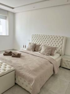 Postel nebo postele na pokoji v ubytování Appartement Duplex Tanger