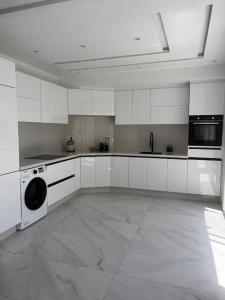 Kuchyň nebo kuchyňský kout v ubytování Appartement Duplex Tanger