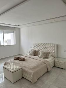 Postel nebo postele na pokoji v ubytování Appartement Duplex Tanger