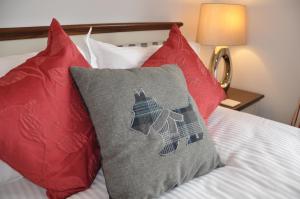 Postel nebo postele na pokoji v ubytování Westgate Apartments Birchlee