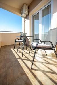 Balkón nebo terasa v ubytování Downtown Comfy Studio