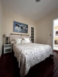 Ένα ή περισσότερα κρεβάτια σε δωμάτιο στο Céntrico y cómo departamento en el Centro de la ciudad de México