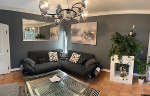 Posezení v ubytování Wohnung 5 mit Garten und sonniger Terrasse