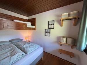 Postel nebo postele na pokoji v ubytování Appartement Sonnenblume - Haus Kärnten