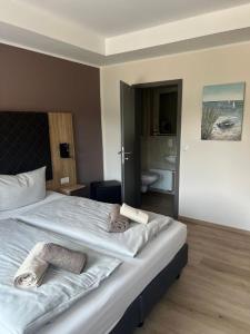 Letto o letti in una camera di Hotel Preyt -Self Check In-