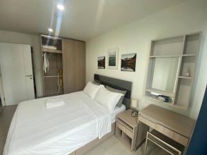 Letto o letti in una camera di 素坤逸50巷一房一厅免费Wi-Fi简单安静可做饭交通方便