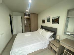 Letto o letti in una camera di 素坤逸50巷一房一厅免费Wi-Fi简单安静可做饭交通方便