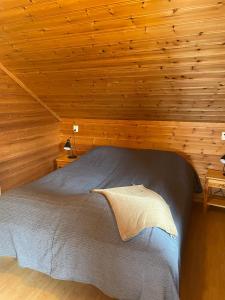 Ένα ή περισσότερα κρεβάτια σε δωμάτιο στο Seaside 3-bedroom Holiday home