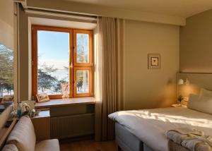 Postel nebo postele na pokoji v ubytování LaSpa Beach House
