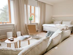 Postel nebo postele na pokoji v ubytování LaSpa Beach House
