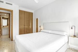 Ένα ή περισσότερα κρεβάτια σε δωμάτιο στο Puerto Romano Denia +13 φωτογραφίες