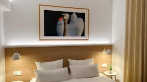 Postel nebo postele na pokoji v ubytování LaSpa Beach House