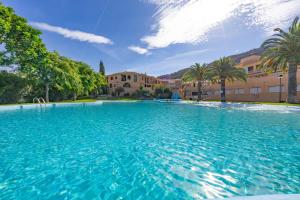 Bazén v ubytování Calú nebo v jeho okolí