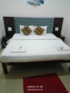 Postel nebo postele na pokoji v ubytování Hotel Baga inn