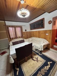 Postel nebo postele na pokoji v ubytování Anilio House