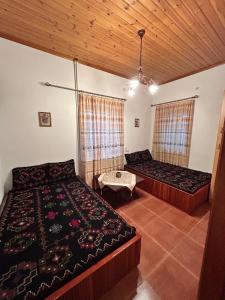 Postel nebo postele na pokoji v ubytování Anilio House