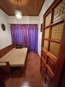 Postel nebo postele na pokoji v ubytování Anilio House