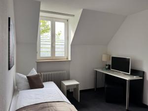 Postel nebo postele na pokoji v ubytování Eisberg Hotel Schwanen