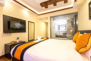 Letto o letti in una camera di Devo Boutique Hotel