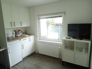 Kuchyň nebo kuchyňský kout v ubytování Ferienhaus Suda