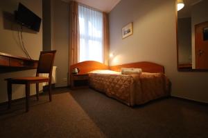 Posteľ alebo postele v izbe v ubytovaní Nasz Klub - Pokoje Gościnne
