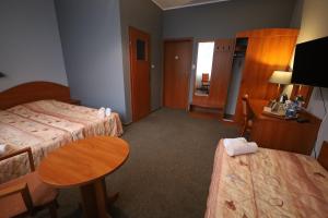 Posteľ alebo postele v izbe v ubytovaní Nasz Klub - Pokoje Gościnne