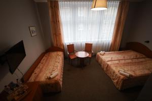 Posteľ alebo postele v izbe v ubytovaní Nasz Klub - Pokoje Gościnne