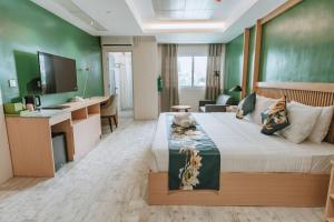Televiisor ja/või meelelahutuskeskus majutusasutuses Diane Residences