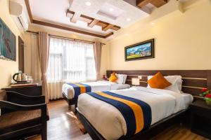 Letto o letti in una camera di Devo Boutique Hotel