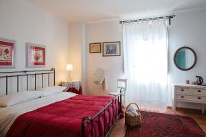 Postel nebo postele na pokoji v ubytování Casale Giancesare Villa Agricola