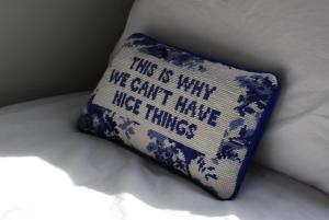 a pillow that says the be why we canthate thee things at Ecco Lodge Caravan in Leysdown-on-Sea