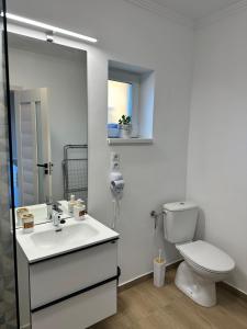 Kúpeľňa v ubytovaní Réz Apartmanok Gyula