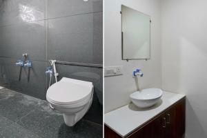 Koupelna v ubytování Hotel O Dabhoi Vadodara