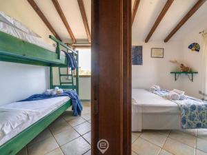 Posteľ alebo postele v izbe v ubytovaní Casa di Greta