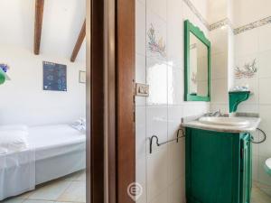 Posteľ alebo postele v izbe v ubytovaní Casa di Greta