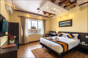 Letto o letti in una camera di Devo Boutique Hotel