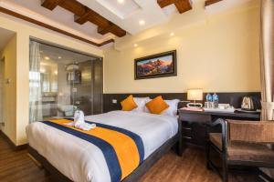 Letto o letti in una camera di Devo Boutique Hotel