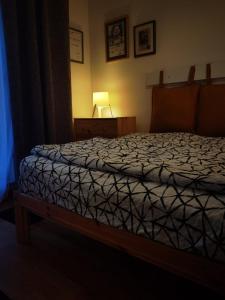 Llit o llits en una habitació de Apartman DETLIĆ Divčigora