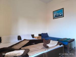 Postel nebo postele na pokoji v ubytování DWARIKA HOTEL