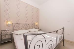 Posteľ alebo postele v izbe v ubytovaní Apartment Bareta