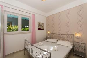 Posteľ alebo postele v izbe v ubytovaní Apartment Bareta