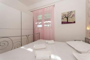 Posteľ alebo postele v izbe v ubytovaní Apartment Bareta