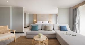 Postel nebo postele na pokoji v ubytování Eastin Resort Rayong